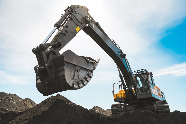 An excavator digging coal.