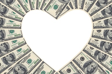 $100 bills forming heart