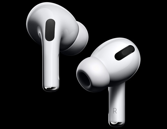 Apple's new AirPod Pro on black background.