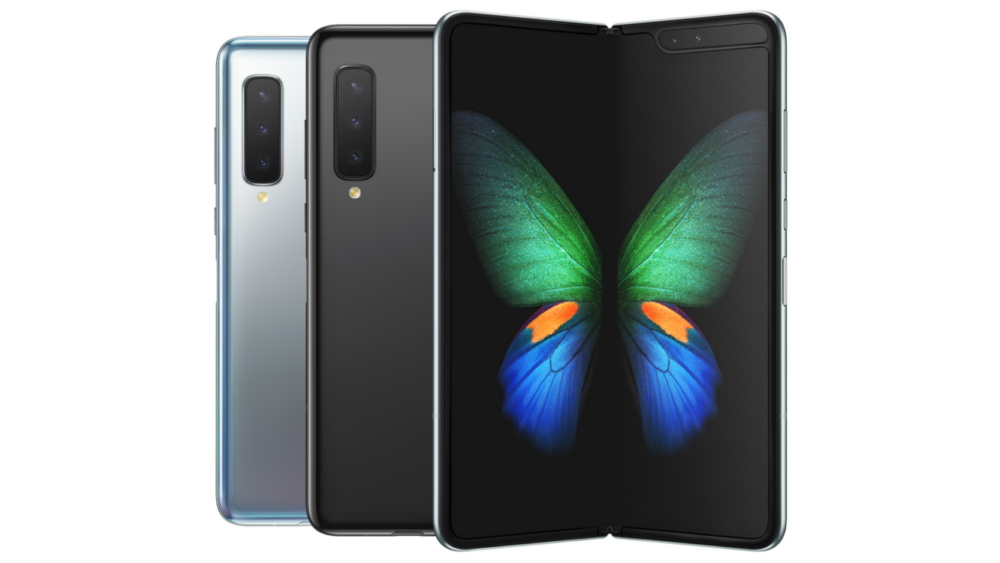 The Samsung Galaxy Fold smartphone, with the two halves unfolded to reveal a big OLED screen inside with the image of a butterfly.