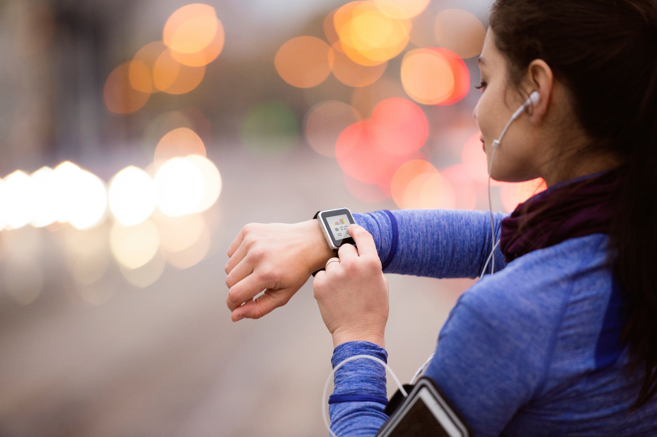 Woman wearing wearable fitness devices