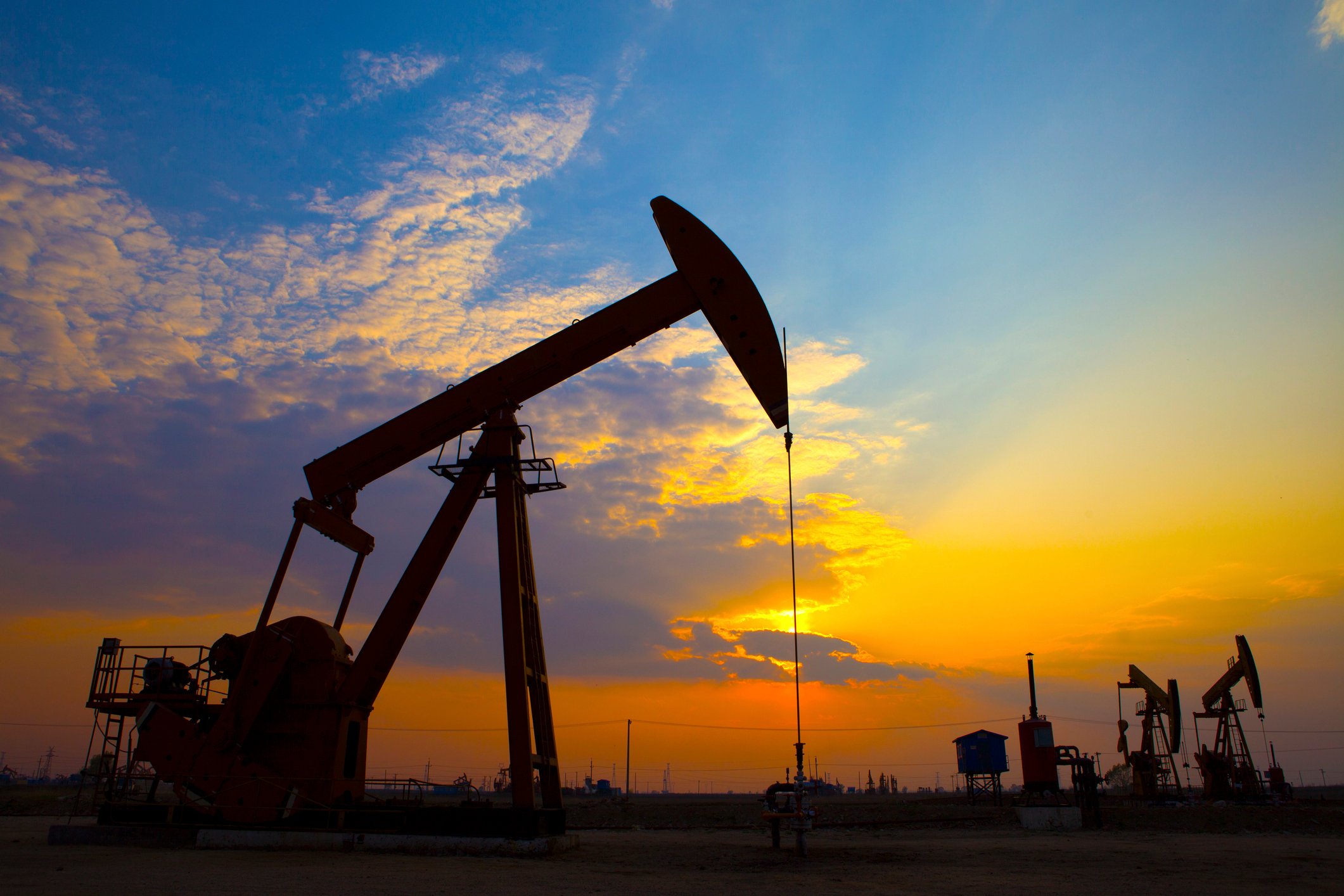 An oil pump at sunset.