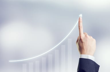Finger pointing to line chart going up