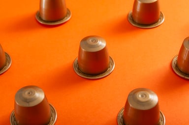 Coffee Pods on Orange Background