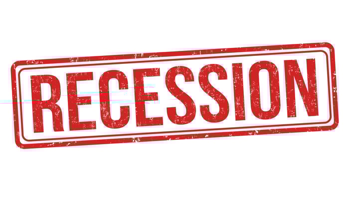 A stamp bearing the word "recession"