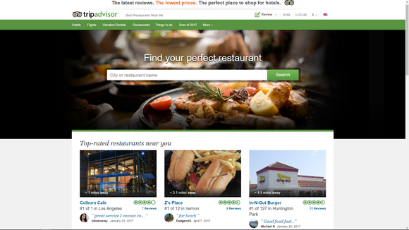 TripAdvisor website page, with three destinations and a picture of food at a restaurant.
