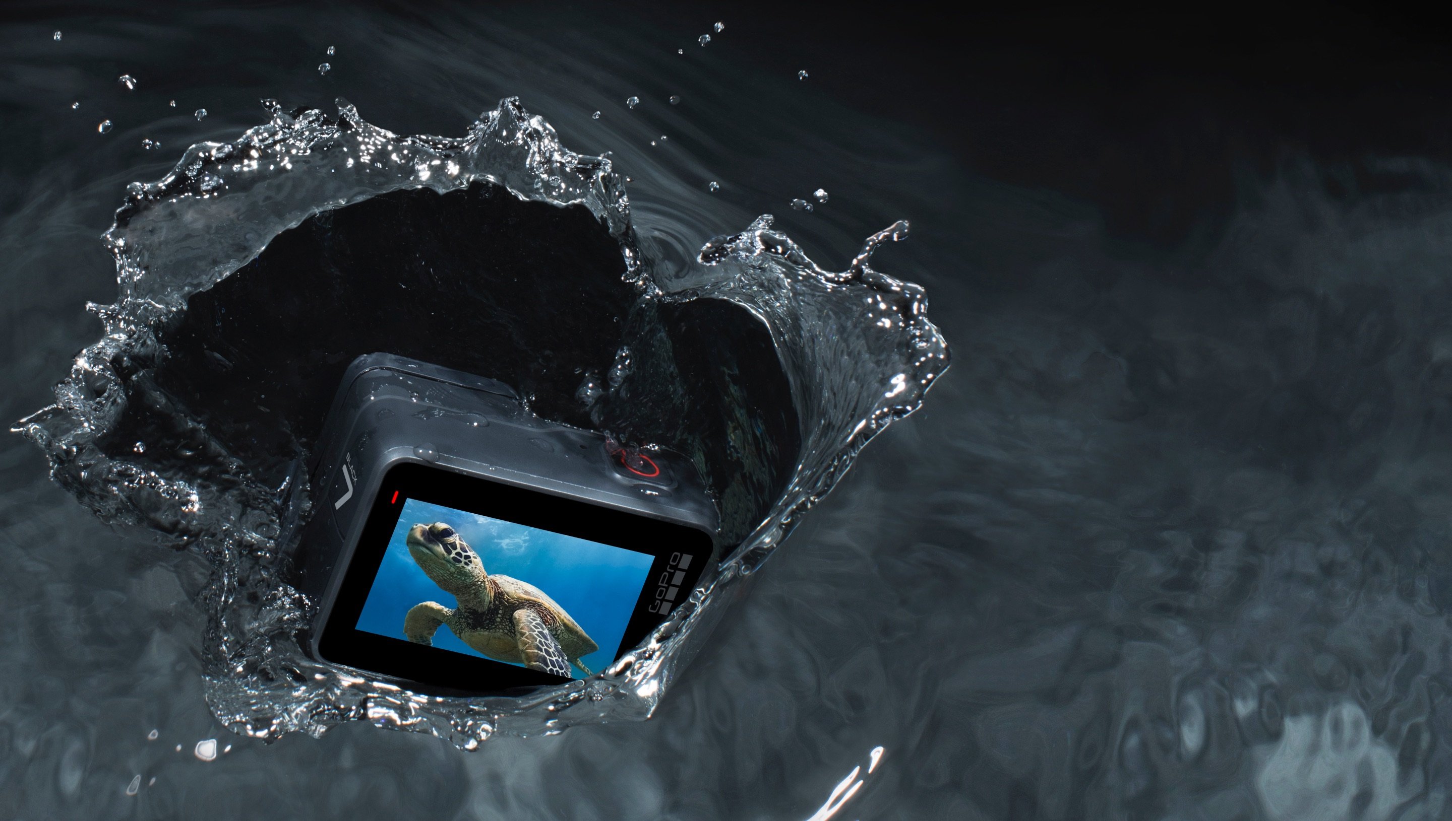A Hero 8 Black camera drops into the water.