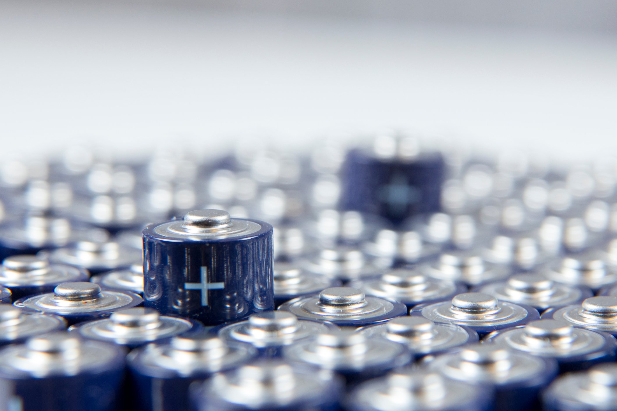 Close-up of a shiny batch of alkaline "AA" batteries.