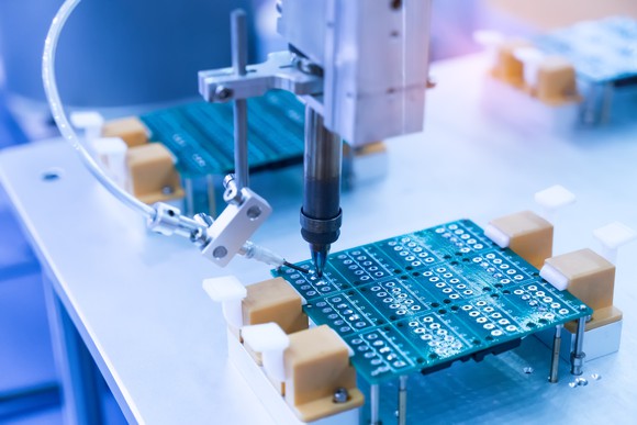 Machine building a semiconductor chip.