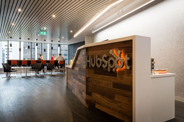 A reception desk that says Hubspot