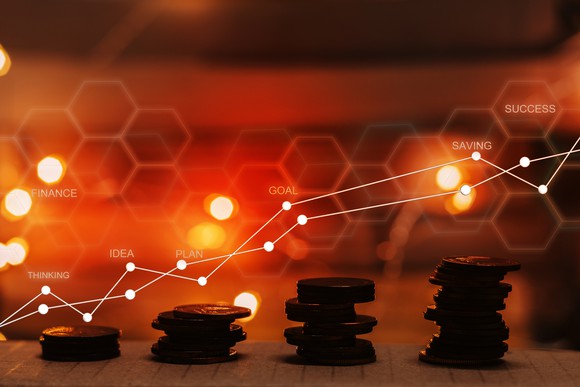 Stacks of coins with trend lines above