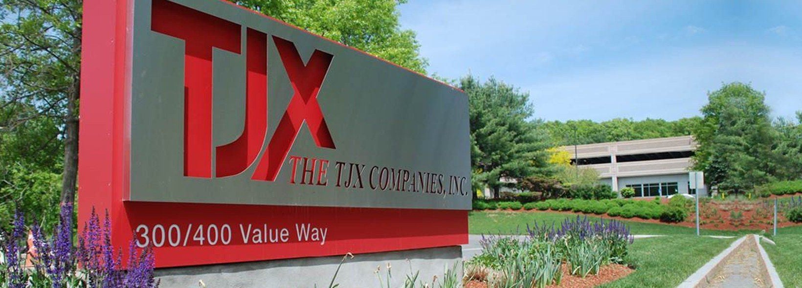 TJX sign in red outside corporate headquarters.