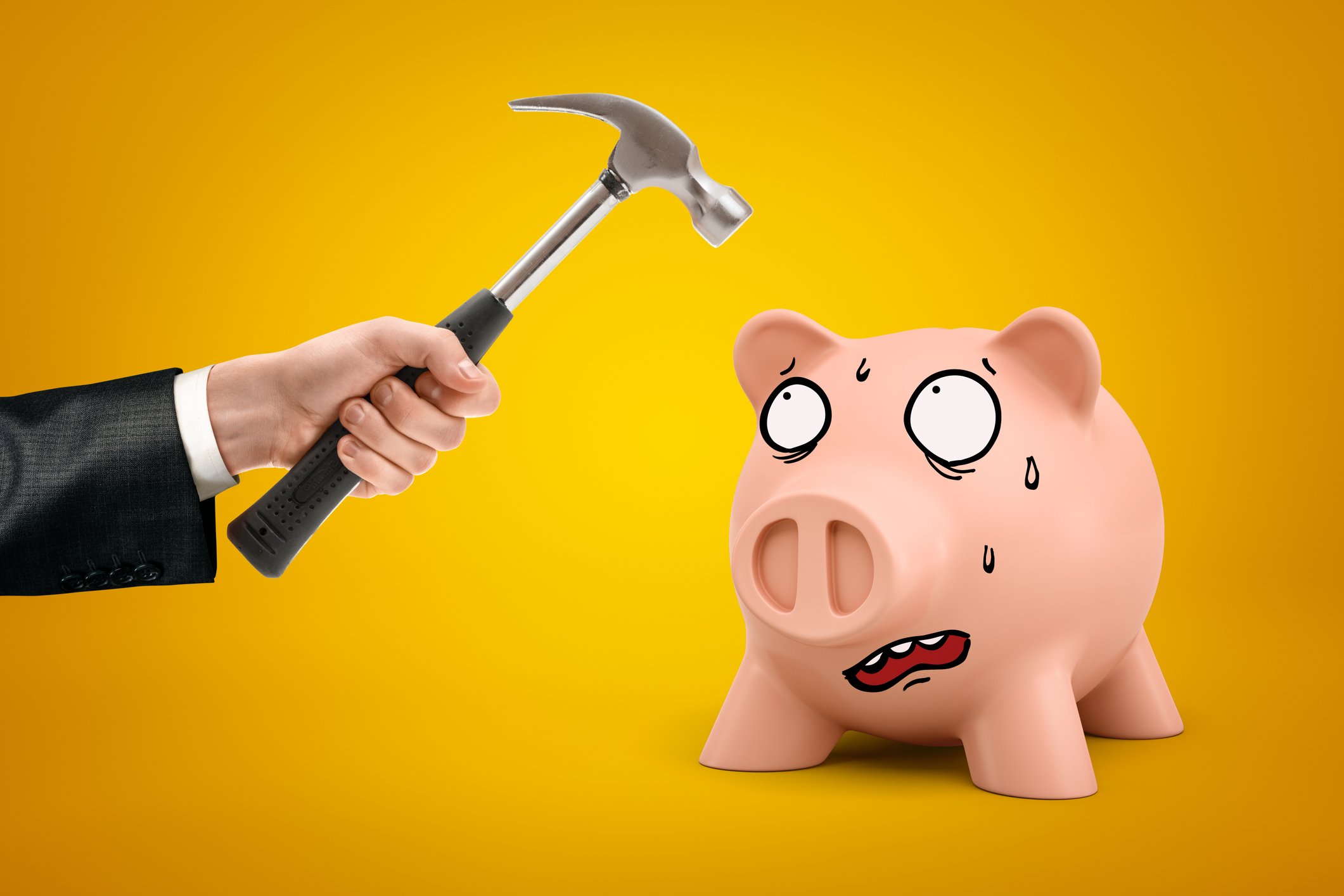 Piggy bank and hammer