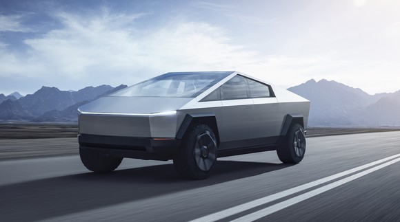 The Tesla Cybertruck, a sharply angular stainless-steel-bodied futuristic pickup truck.