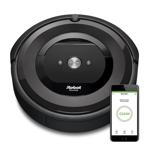 iRobot's Roomba E5 (5150) robotic vacuum cleaner next to the Roomba app displayed on a smartphone.