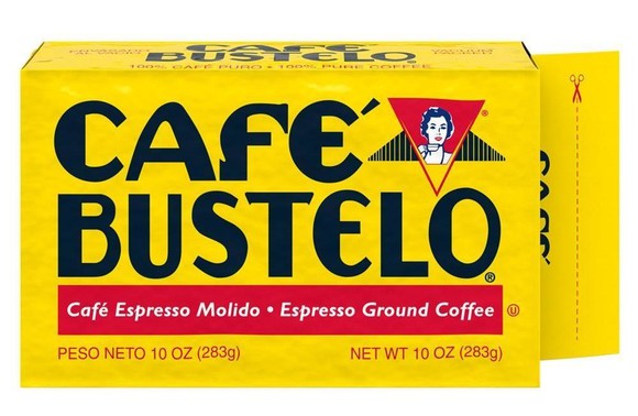 A brick of vacuum-packed ground Cafe Bustelo  coffee in bright yellow packaging.