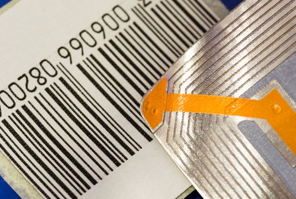A close-up of an RFID chip and a barcode.