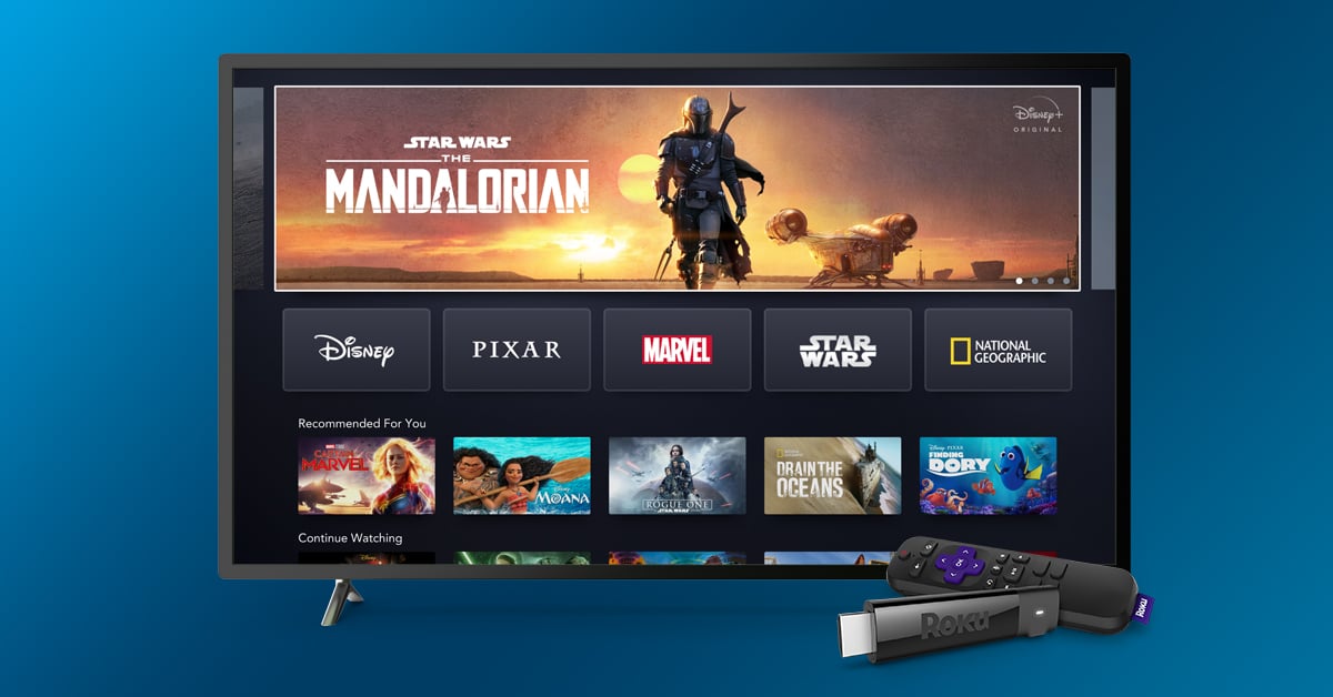 Disney+ displayed on a TV next to Roku stick and remote