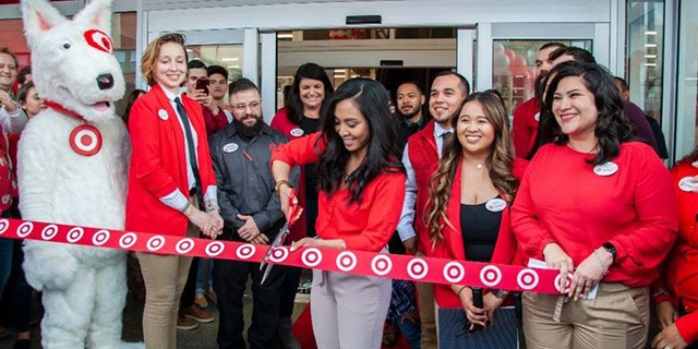 Target employees in a ribbon cutting ceremony. 