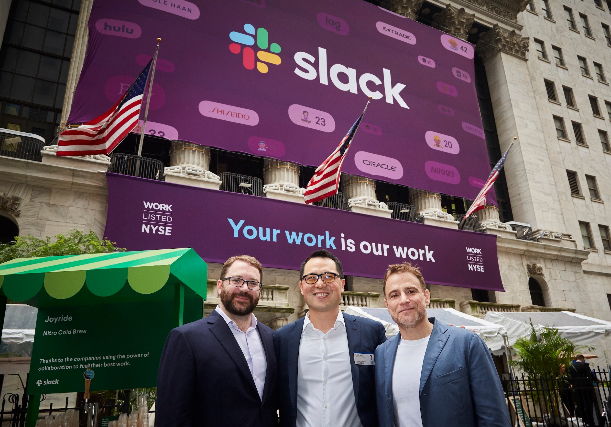 Slack leadership standing outside the New York Stock Exchange the day of the company's direct listing