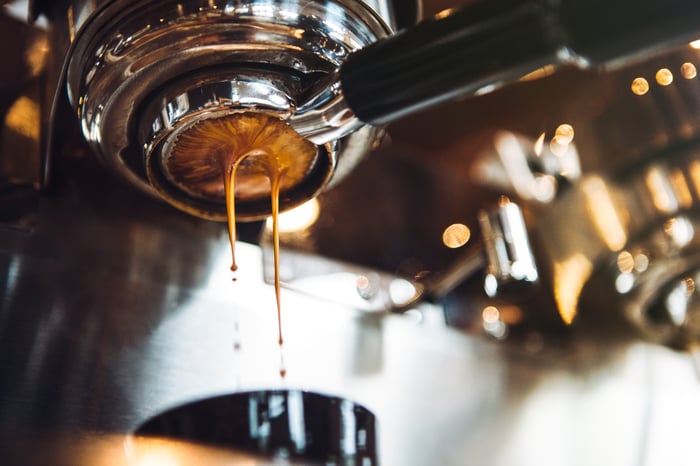 Espresso machine dripping coffee