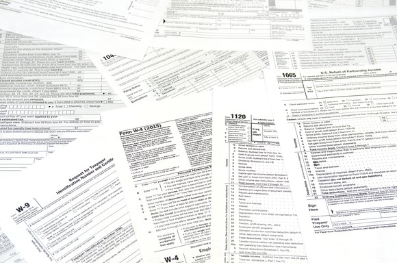 Spread-out tax forms and instructions.