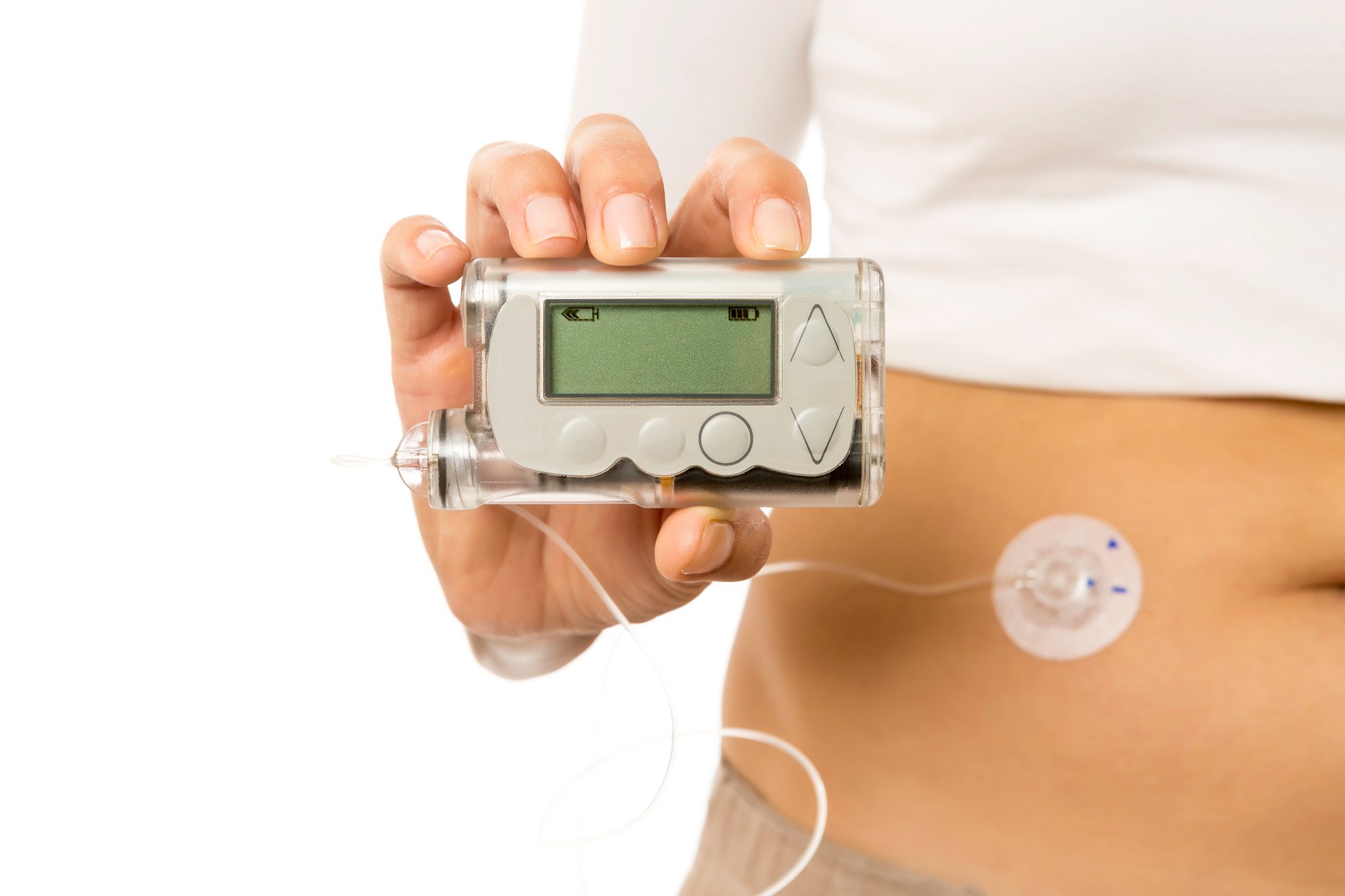 Diabetic patient holding a glucose monitor.