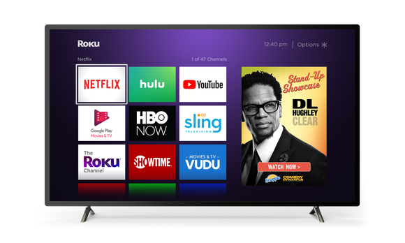 A TV displaying the Roku home screen featuring an advertisement