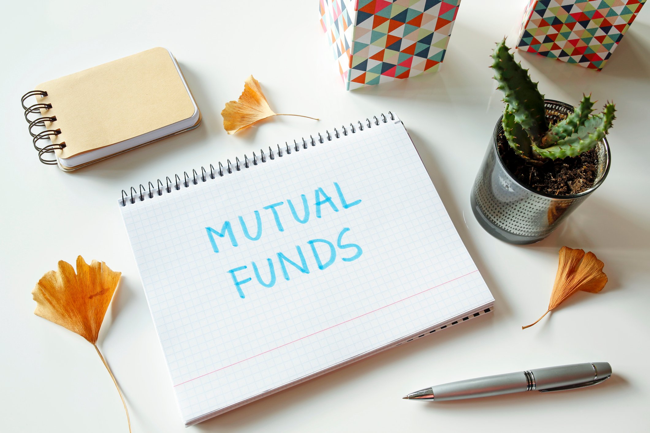 The words Mutual Funds written on a notepad