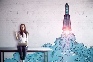 rocket ship with woman sitting on bench