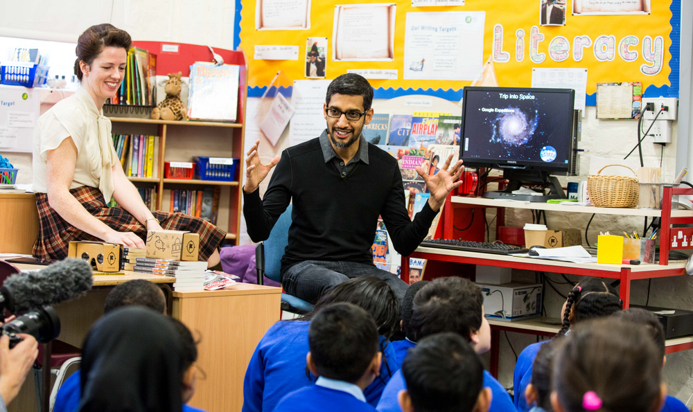 Sundar Pichai speaking to a classroom full of young students