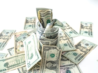 A jar overflowing with cash.