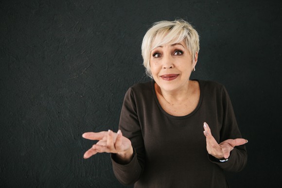 Older woman looking confused