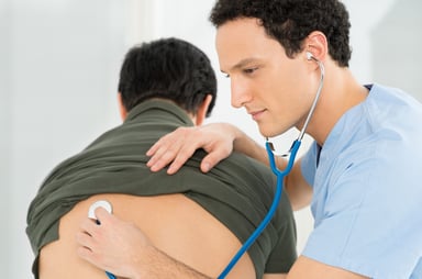 doctor with patient_GettyImages-486169457