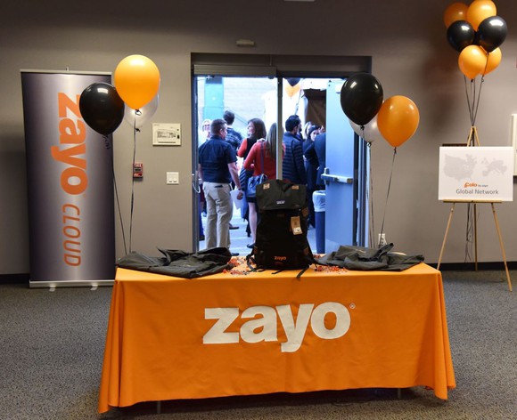 Zayo employees at a company event.