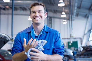 Auto Repair Worker in Blue Uniform