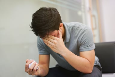 someone experiencing a headache