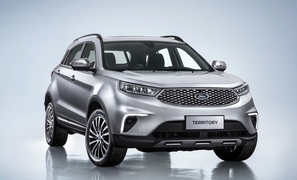 A silver Ford Territory, a sleek compact crossover SUV.