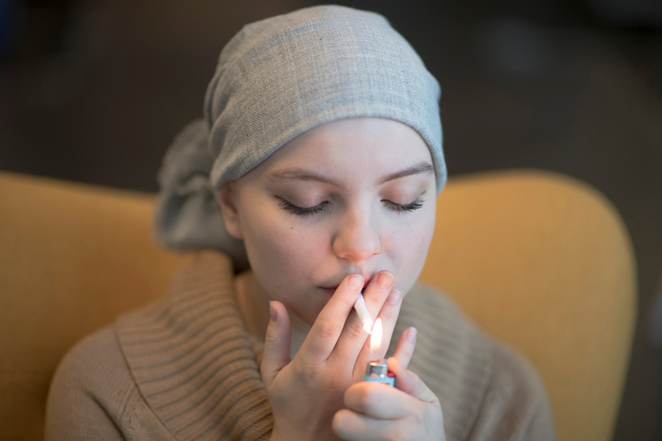 Female cancer patients smoking some medical marijuana.