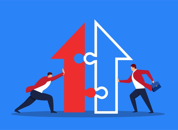 Graphic of two puzzle pieces pushed together to form an arrow pointing upward