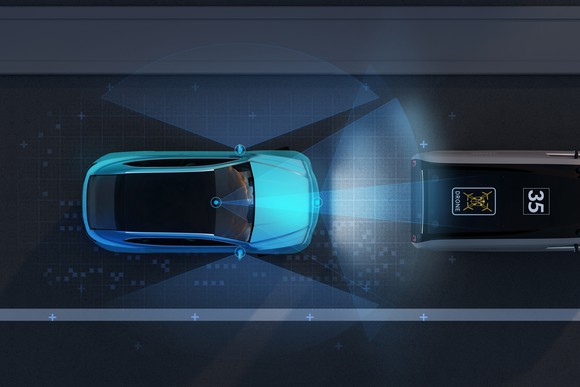 A driverless car scans the road ahead.