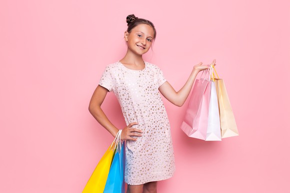 Tween girl with shopping bags
