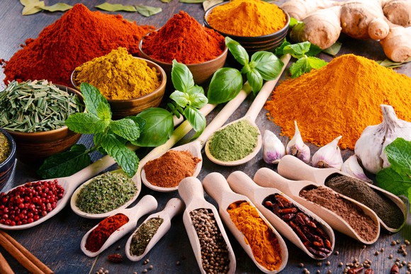 A number of different and colorful spices and herbs.