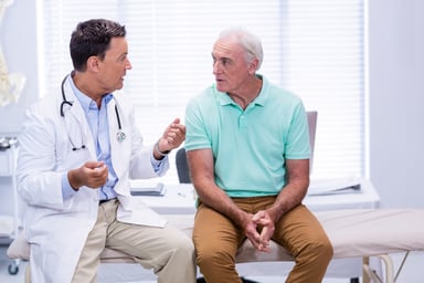 doctor with senior man_GettyImages-653832844