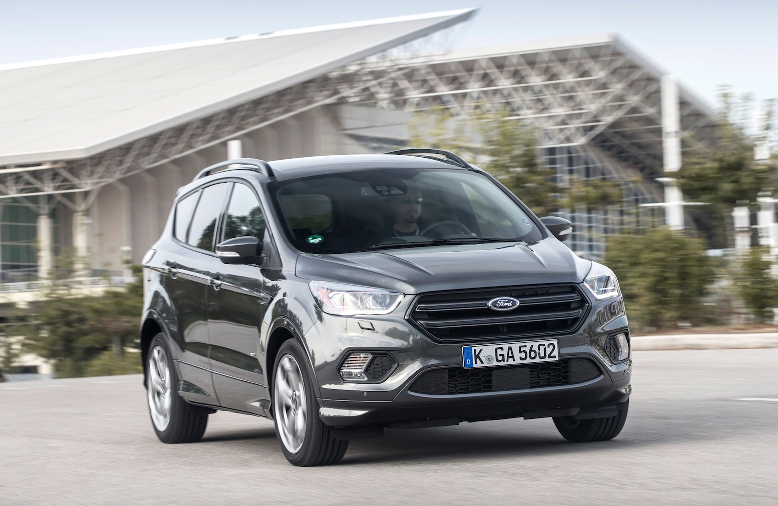 A Ford Kuga, a compact crossover SUV, with European license plates.