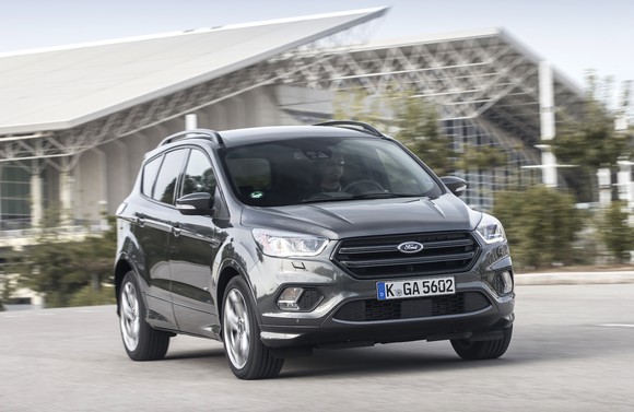 A Ford Kuga, a compact crossover SUV, with European license plates.