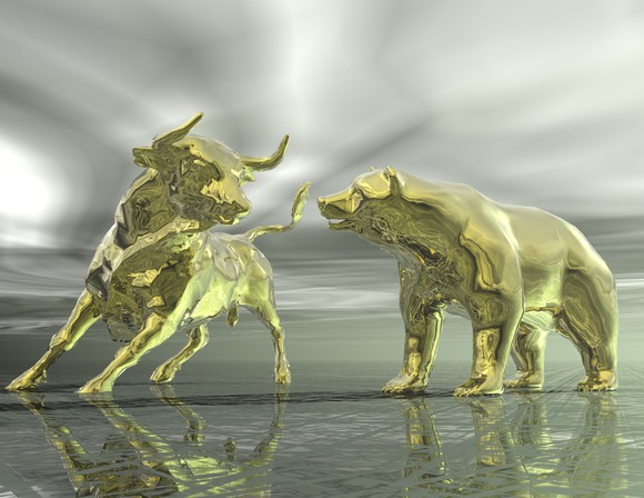 Rendering of two golden statues, a bull and a bear, facing off against each other on a glassy surface.