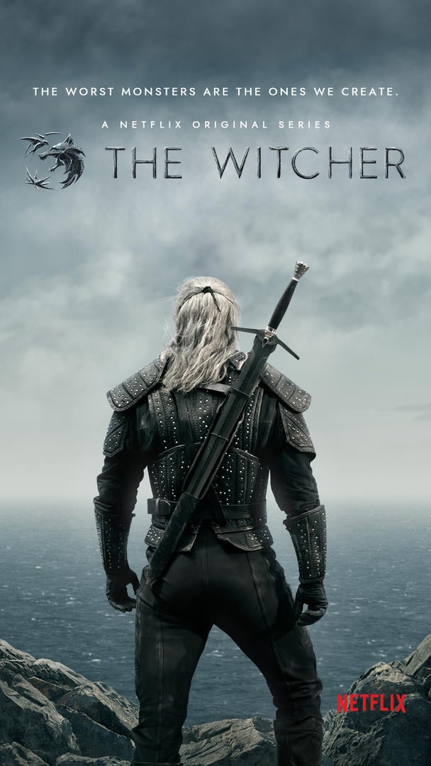 Poster for The Witcher showing the back of a man wearing medieval-looking combat gear