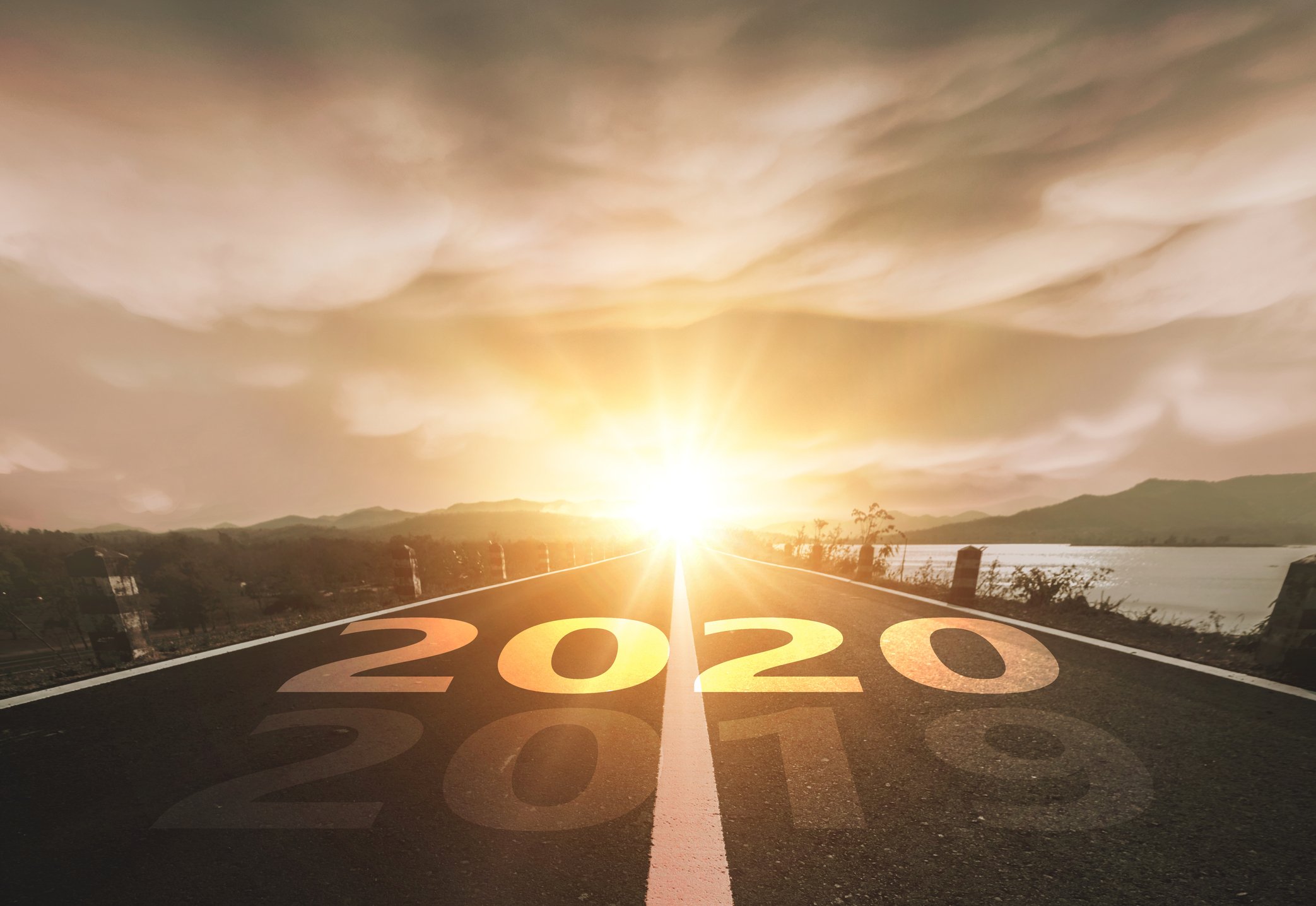 An open road with 2020 painted across it.