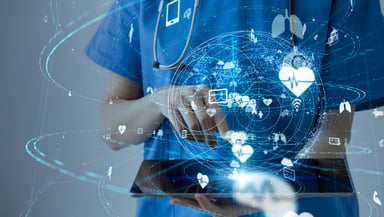 Doctor with touchscreen tablet and medical images